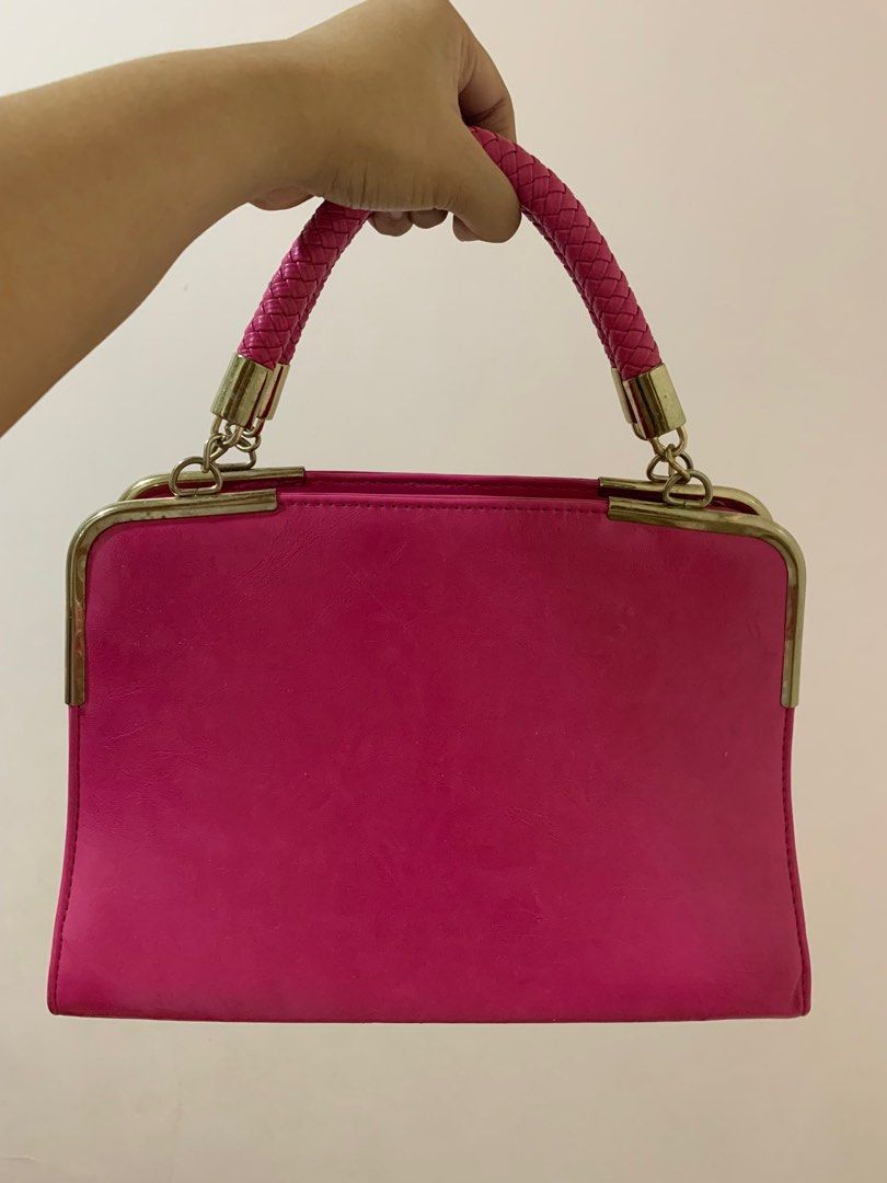 Pink Fashion Hand Bag (Category: Shoulder Bags) located in Marikina City. Submitted by mrs.bee_09 (Listing ID 1238566859, Image 2). Description: **DECLUTTERING** - Used only twice; Not properly stored - With signs of usage - Metal has stains - Still in good condition Suitable for: - Casual attire (e.g. jeans, printed top) - Semi-formal outfit.