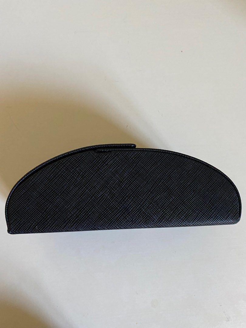 Prada Sunglass Case (Category: Women's Accessories) located in Brisbane. Submitted by fashionista4 (Listing ID 1238561056, Image 3). Description: Prada sunglass case & cleaning cloth Minor marks on bottom (could come off with a scrub).