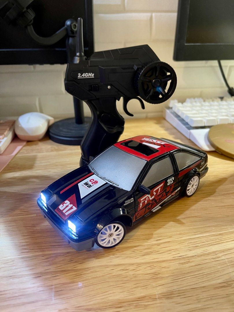 RC DRIFT CAR ( 1:24 scale ) ALL WHEEL DRIVE (Category: Remote Control Toys) located in Quezon City. Submitted by rctechworld (Listing ID 1238558692, Image 3). Description: RC DRIFT CAR ALL WHEEL DRIVE COLLECTIBLE fix price 2.4ghz remote technology complete set battery pack and charger smallest drift car.
