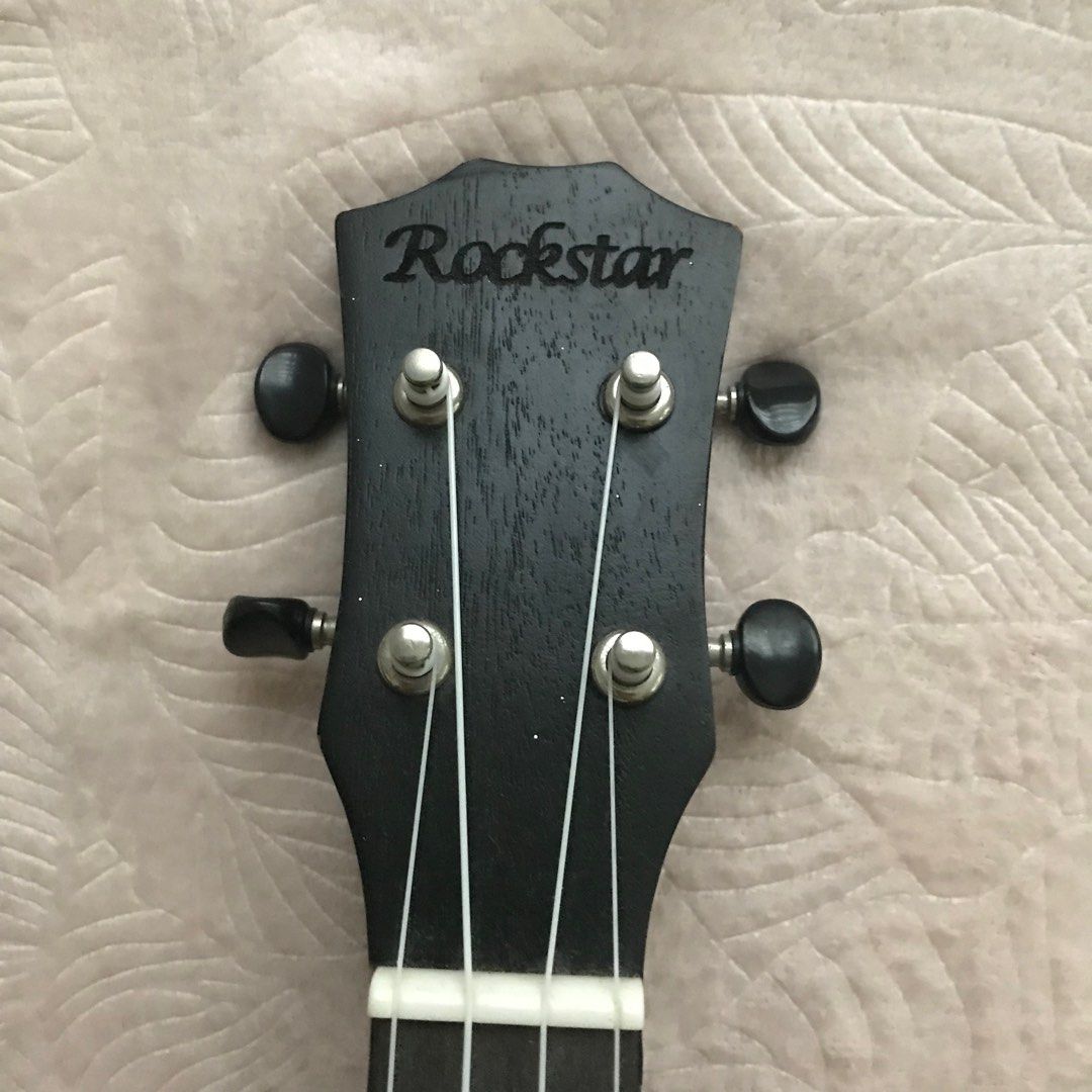 Rockstar Black Ukelele (Category: Musical Instruments) located in Manila. Submitted by ziedeclutters (Listing ID 1238524236, Image 2). Description: FIXED PRICE Delivery thru lalamove or grab only In good condition, 9.5/10 No COD, accepting payments through GCash .