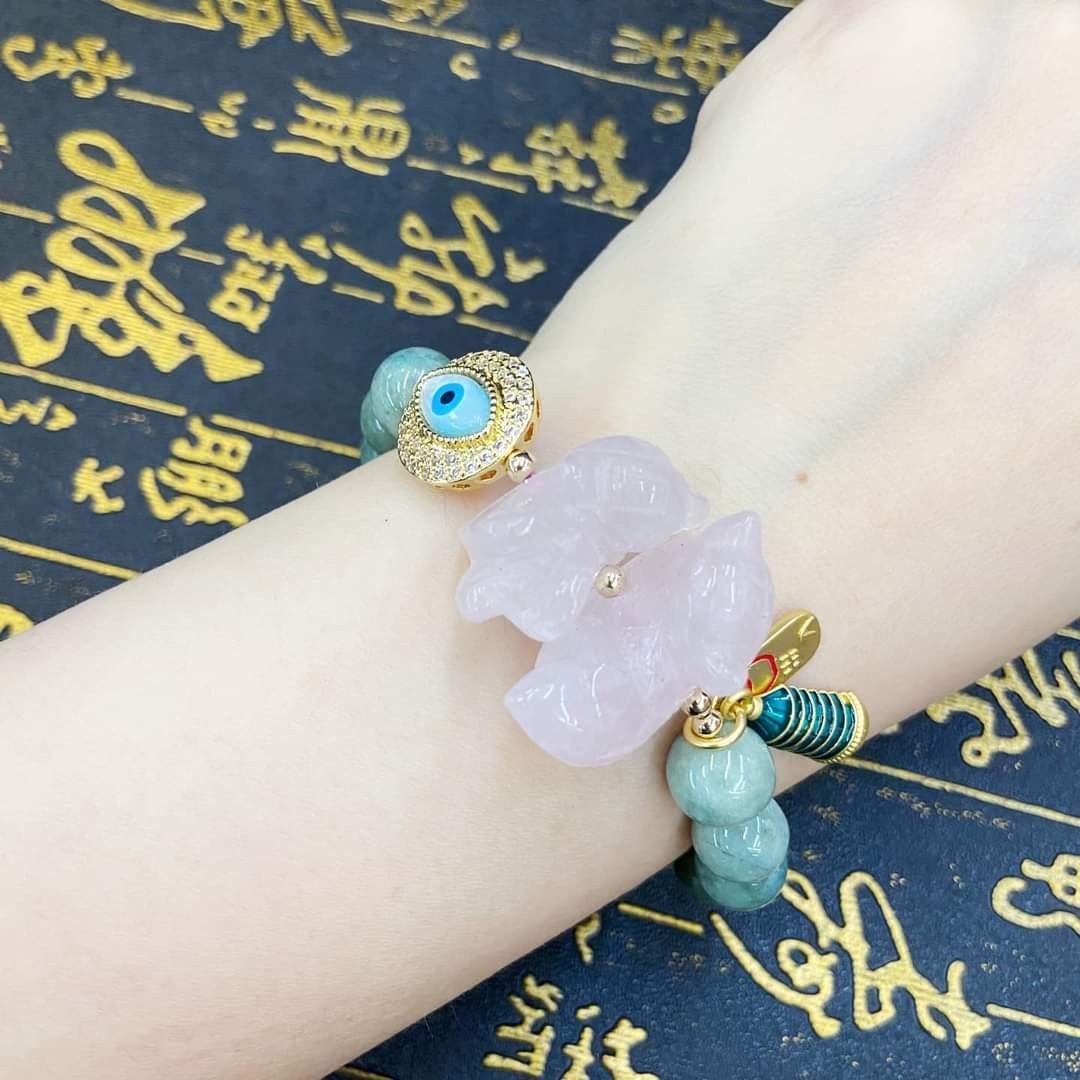 Rose quartz mandarin duck with evil eye pagoda bracelet Women s Fashion Jewelry Organizers Bracelets on Carousell