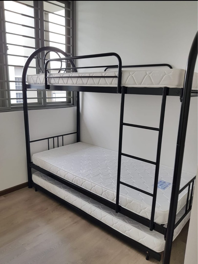 Second hand bunk bed frame with a pull out mattress rack