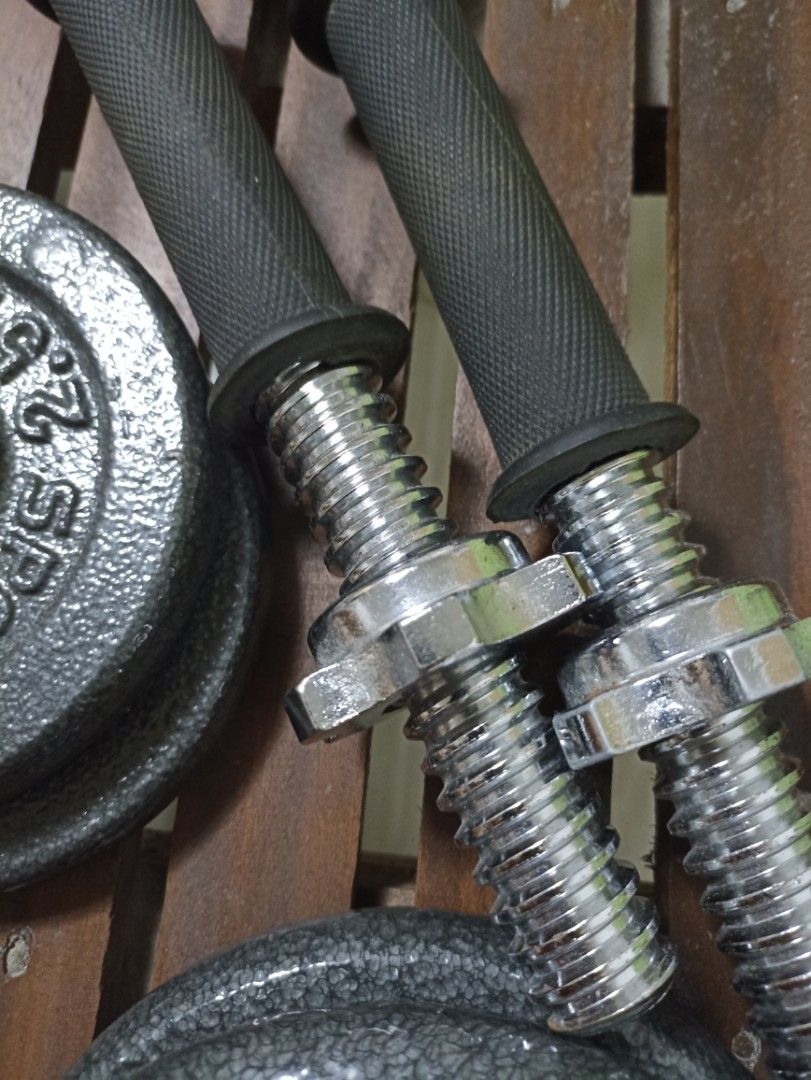 Sports Authority Dumbbell/Plates (Category: Weights & Dumbbells) located in Tarlac. Submitted by declutteringdaha (Listing ID 1238576457, Image 2). Description: Total of 30lbs 5 lbs X 4, 2.5 lbsx4, chrome dumbbell short bar.