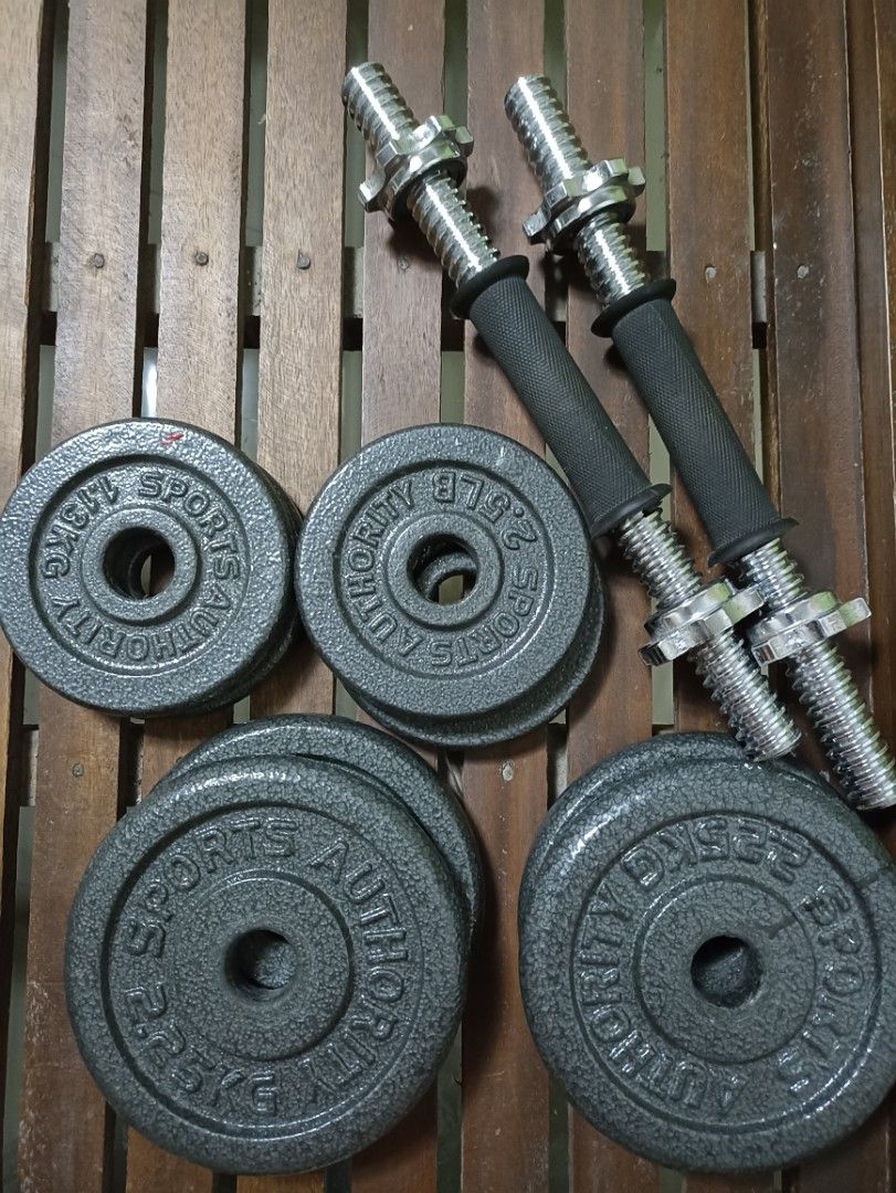 Sports Authority Dumbbell/Plates (Category: Weights & Dumbbells) located in Tarlac. Submitted by declutteringdaha (Listing ID 1238576457, Image 1). Description: Total of 30lbs 5 lbs X 4, 2.5 lbsx4, chrome dumbbell short bar.