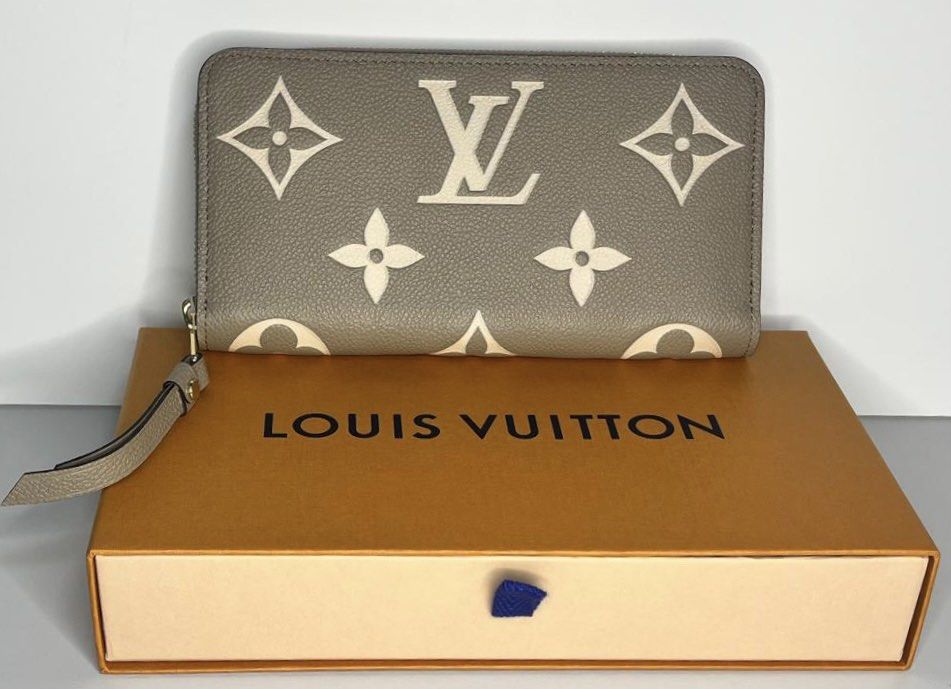 Louis Vuitton Tourterelle/Creme Monogram Empreinte Leather Zippy