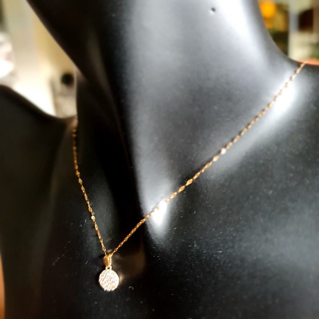 Gold chain with outlet pendant and earrings