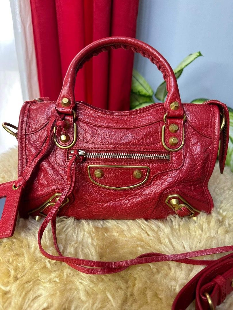 Authentic Balenciaga Mini Metallic Edge Distressed Leather (Category: Luxury Bags & Wallets) located in Quezon City. Submitted by hellopatchi (Listing ID 1238678443, Image 1). Description: Balenciaga Mini Metallic Edge Distressed Leather 9/10 Condition Inclusions: dustbag, strap, mirror .