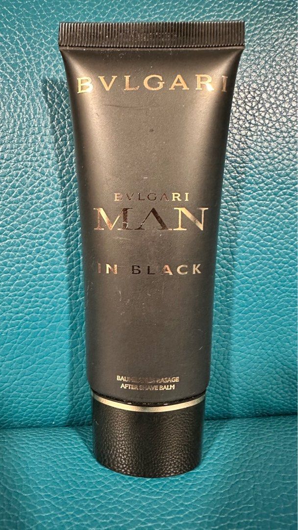 Man in store black aftershave