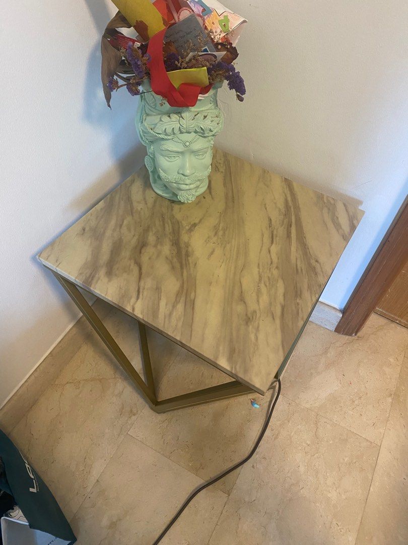 Side Table (Category: Tables & Sets) located in Singapore. Submitted by ifree1993 (Listing ID 1238690125, Image 1). Description: Faux marble side table . Gold coloured base 50cm x 50 x 50cm Height Pick up Bukit Batok.