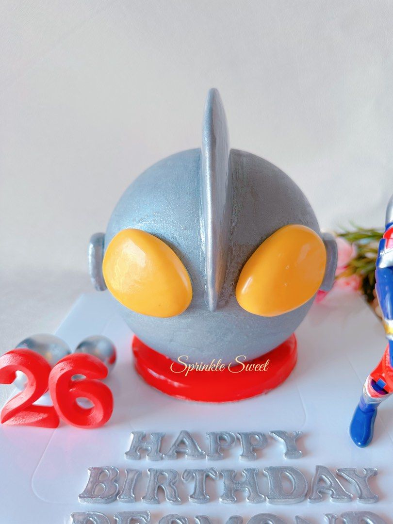 Ultraman piñata cake/Birthday cake/Customised cake (Category: Homemade Bakes) located in Singapore. Submitted by sprinklesweet (Listing ID 1238622801, Image 2). Description: Knock Knock!!! This delightful Piñata cake is full of surprises, as the birthday boy/girl have to use a provided wooded hammer to break open the rich chocolate layer to discover what is inside, special and unforgettable!!! -100% homemade, less sweet and no preservative added 