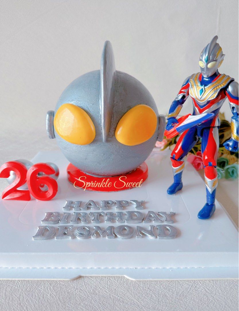 Ultraman piñata cake/Birthday cake/Customised cake (Category: Homemade Bakes) located in Singapore. Submitted by sprinklesweet (Listing ID 1238622801, Image 1). Description: Knock Knock!!! This delightful Piñata cake is full of surprises, as the birthday boy/girl have to use a provided wooded hammer to break open the rich chocolate layer to discover what is inside, special and unforgettable!!! -100% homemade, less sweet and no preservative added 