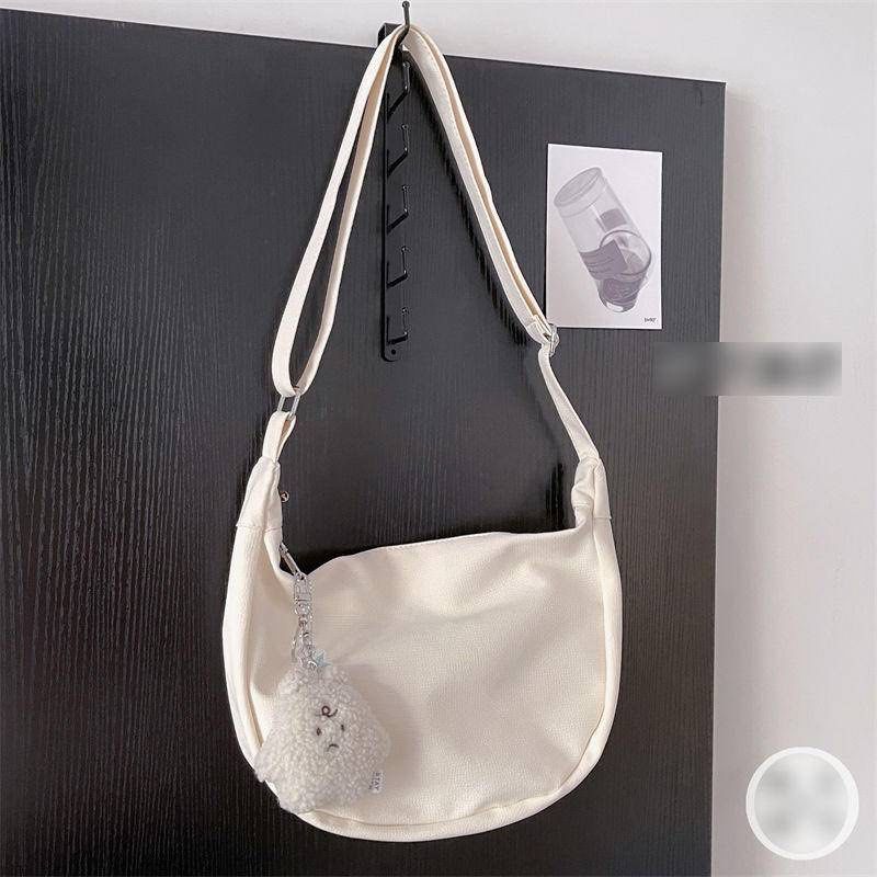 white messenger bag
