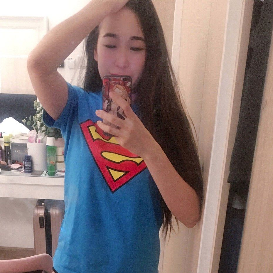 Girl wearing online superman t shirt