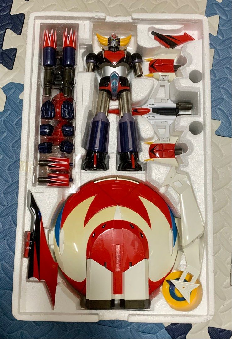 清屋大割引！ 2000年Bandai 超合金魂GX-04 巨靈神UFO Robo Gren Dizer  齊件，已剪件，巨靈神銀色電鍍位有輕微氧化，飛碟有少黃！機翼黃色膠件瞓盒瞓彎咗，應可壓回原形！盒有少殘！ 整體約有八成新！
