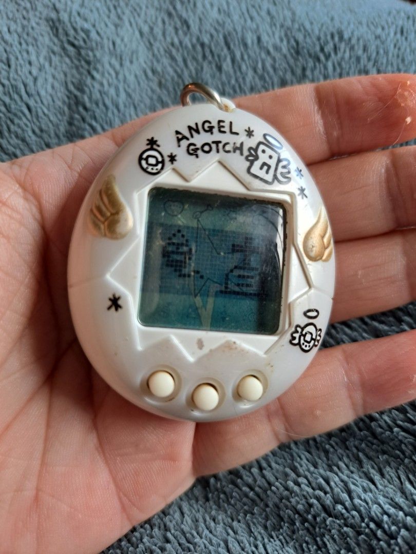 Angelgotchi (angel tamagotchi), Hobbies & Toys, Toys & Games on Carousell
