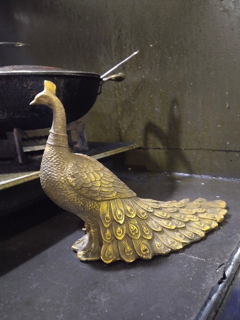 Brass peacock statue display on Carousell