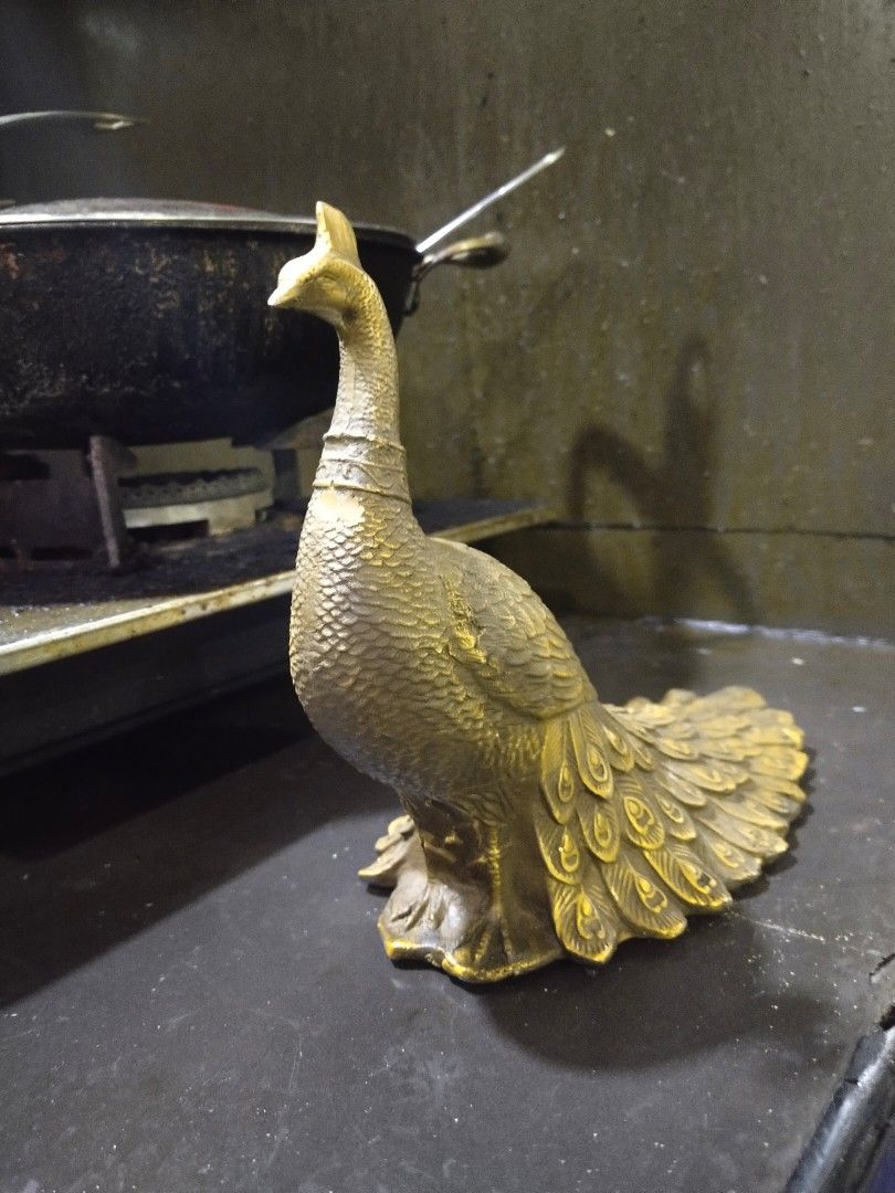 Brass peacock statue display on Carousell