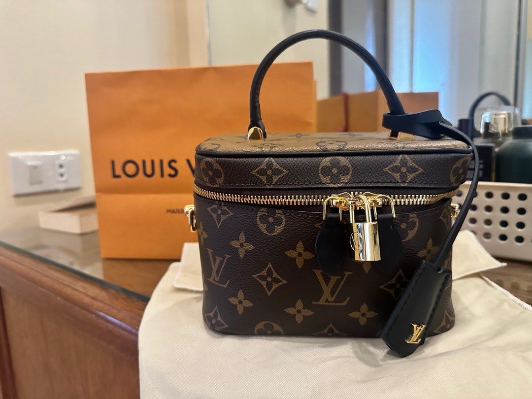 Sold at Auction: Louis Vuitton Vanity PM Black/Beige Empreinte Leather