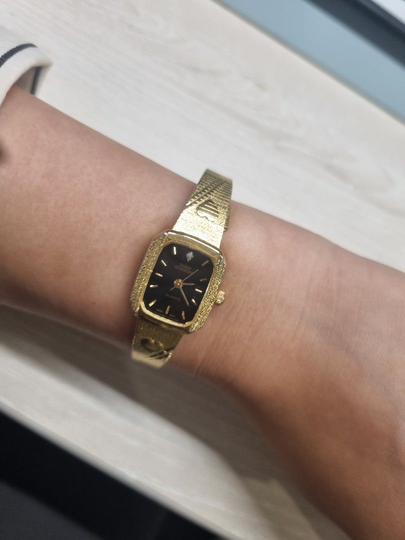 Nakedglory gold metal watch
