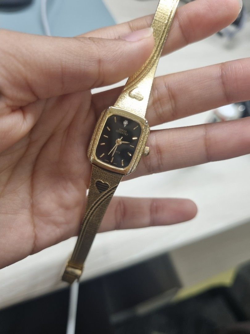 Gold metal watch top