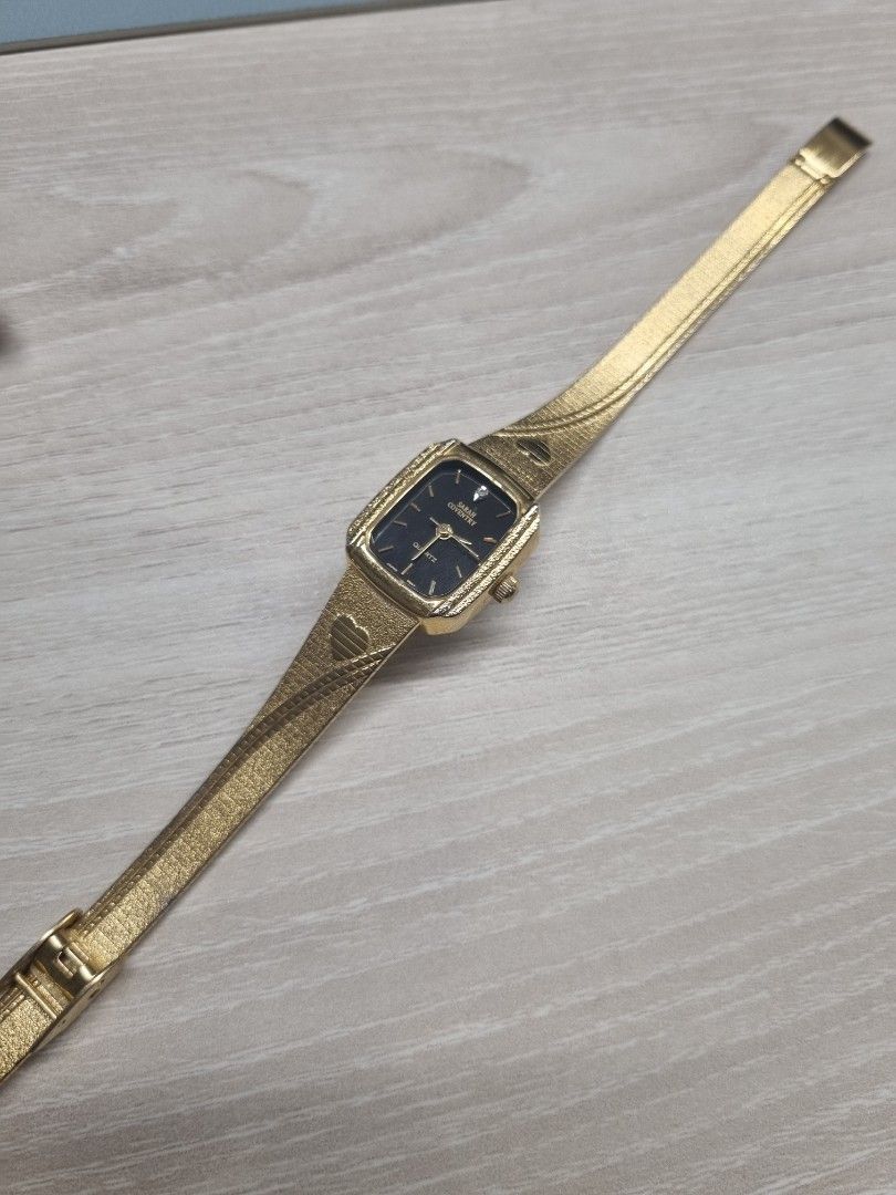 Nakedglory gold metal watch