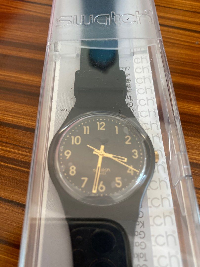 Swatch GB274 Black & Gold Watch (Category: Men's Watches) located in Paranaque City. Submitted by beesbd (Listing ID 1238801964, Image 2). Description: Swatch GB274. Gifted but never used. Still has its case. Plastic on the watch face is still intact. Note that watch’s battery is not working so will need to be changed. See screenshot of Swatch’s details of the watch and original price at Php 4,100. RFS: do not plan to use it MOP: GCash MOD: Gogox