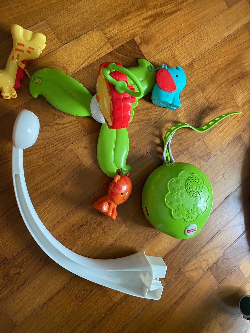 Fisher price rainforest grow with me cot mobile hot sale