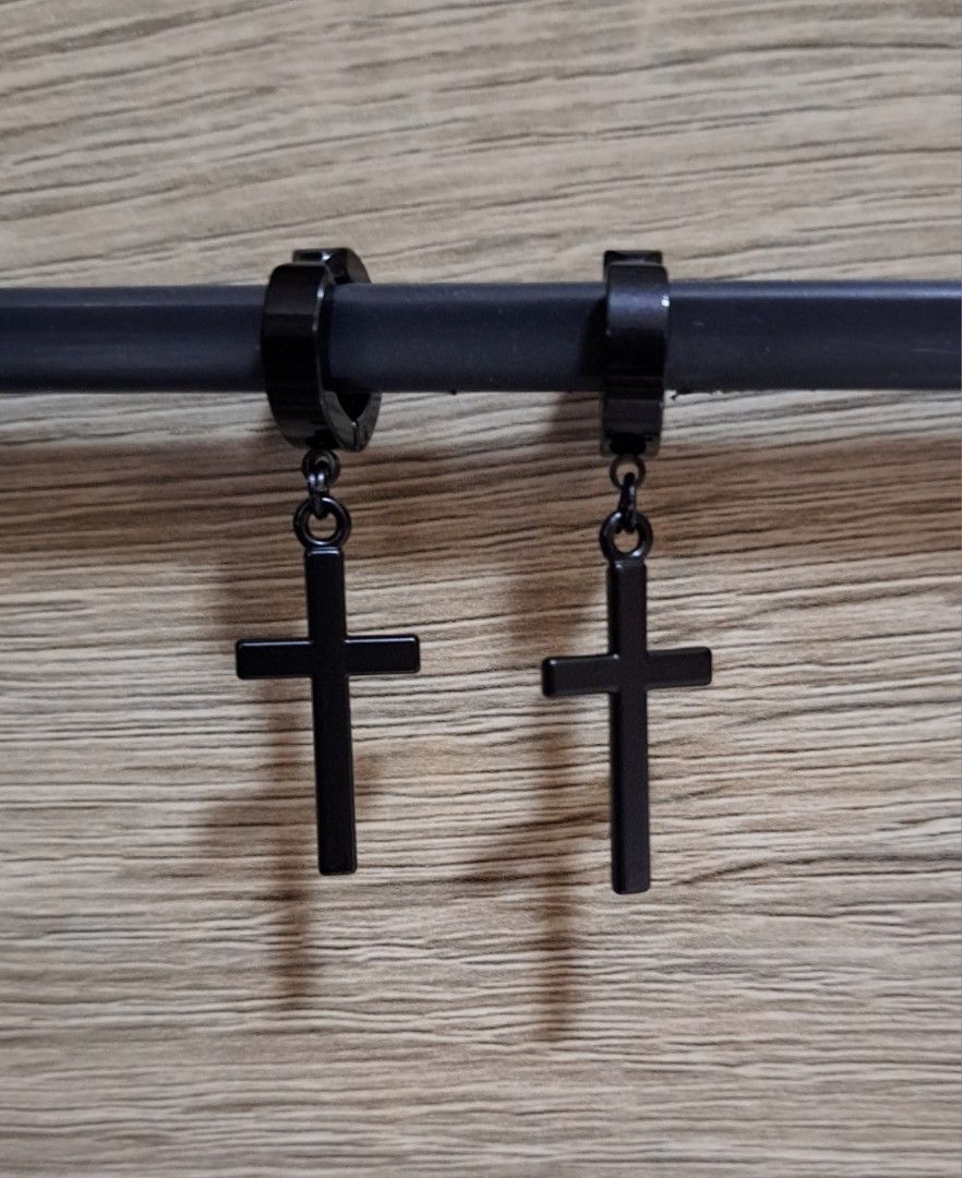Black cross store clip on earrings