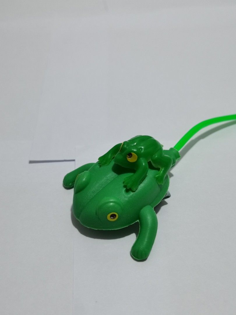 Squeeze bulb jumping frog outlet toy