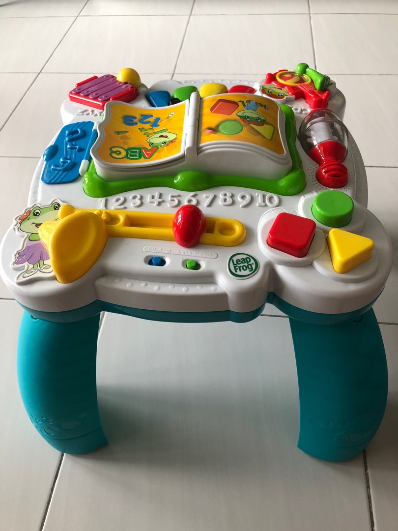 Leapfrog move and store groove musical table