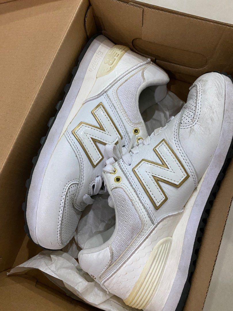 New Balance 574 women shoes Men s Fashion Footwear Sneakers on