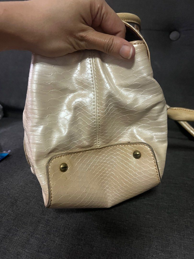 Shoulder bag (Category: Luxury Bags & Wallets) located in Manila. Submitted by cloudswimmer (Listing ID 1239078028, Image 2). Description: Prestine condition Barely used Snake skin Clean interior No flaws Hardware good condition Studs complete Negotiable.