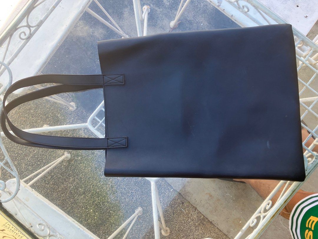 Straightforward Bag — Black (PLS READ DESCRIPTION) (Category: Shoulder Bags) located in Las Pinas. Submitted by randomitems01 (Listing ID 1239020929, Image 3). Description: Straightforward bag in the color black. The bag is made of sturdy material and has been heavily used for years. It was used as an every day bag. Kindly, take note of the science of usage, such as Mike’s on the bag. Stitching seems to be intact. Selling price of this bag is onl