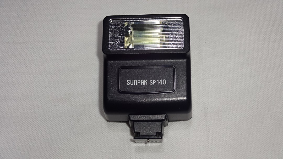 Sunpak SP140 small camera flash with builtin sync cord, Photography