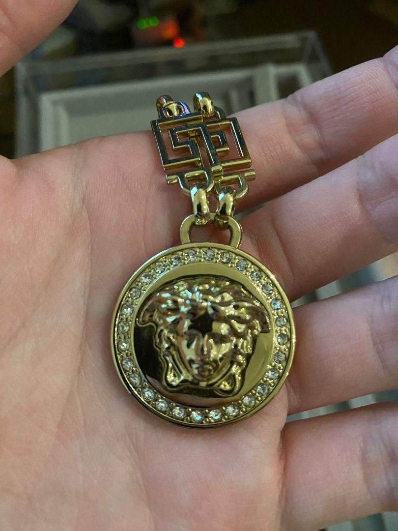 Versace gold pendant outlet