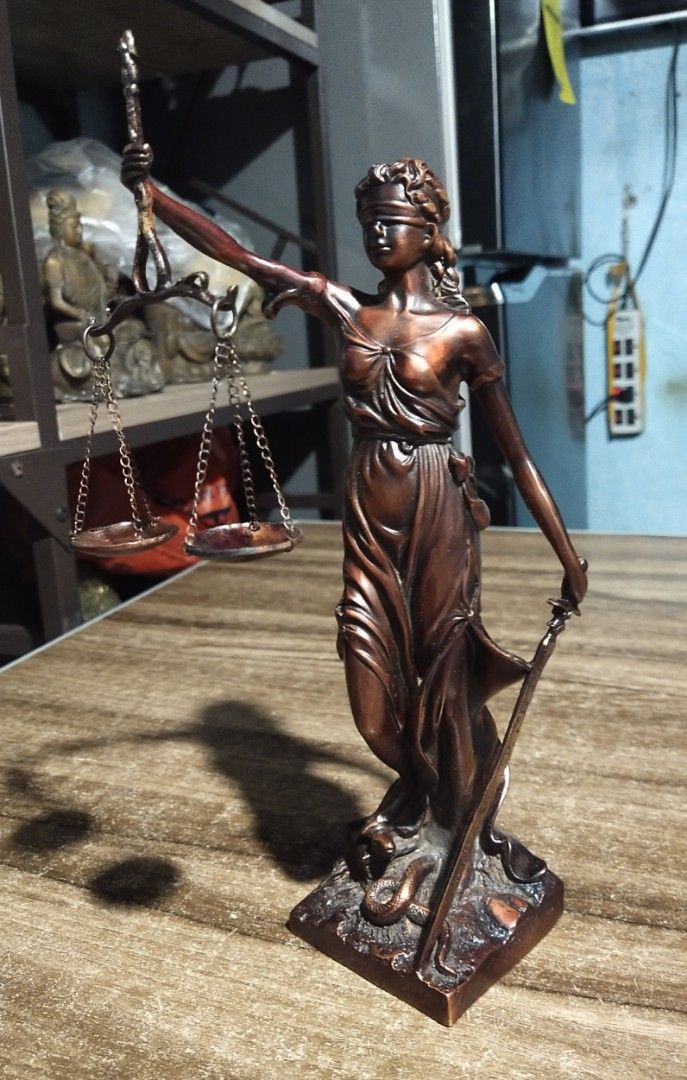 Brass lady justice statue on Carousell