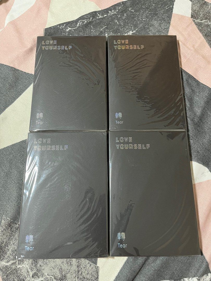 [BTS Album] LOVE YOURSELF TEAR (Category: CDs & DVDs) located in Apalit. Submitted by jamelabi (Listing ID 1239205190, Image 1). Description: BTS LOVE YOURSELF - TEAR Y - SOLD O - available U - available R - available Price: - 300 each version ✨ Complete inclusions except random PC ✨ Each album has a plactic cover. Condition is like new. Opened just to get the ramdom PC. .