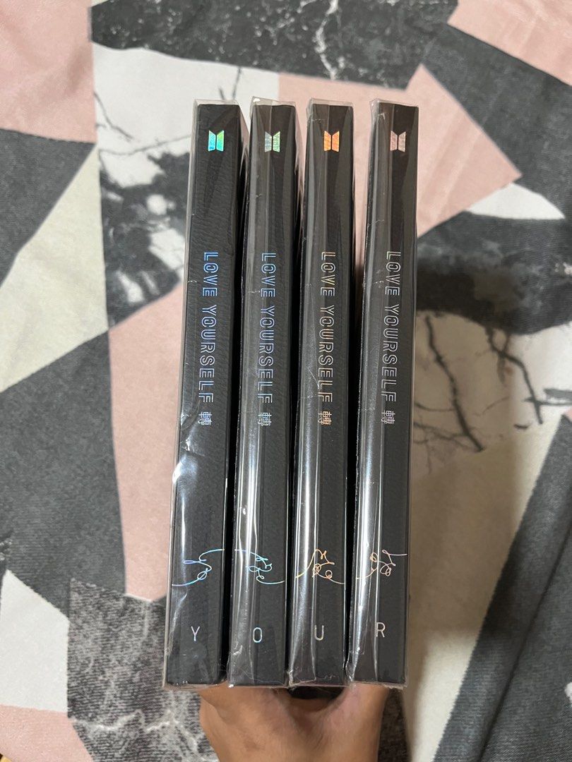 [BTS Album] LOVE YOURSELF TEAR (Category: CDs & DVDs) located in Apalit. Submitted by jamelabi (Listing ID 1239205190, Image 2). Description: BTS LOVE YOURSELF - TEAR Y - SOLD O - available U - available R - available Price: - 300 each version ✨ Complete inclusions except random PC ✨ Each album has a plactic cover. Condition is like new. Opened just to get the ramdom PC. .