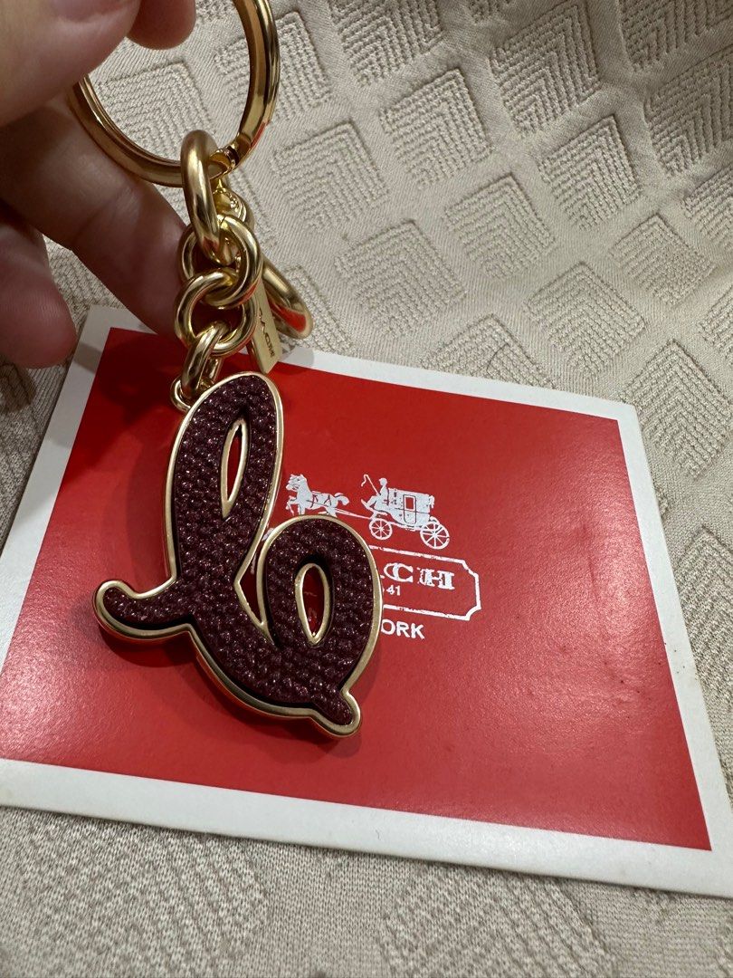Coach c on sale bag charm