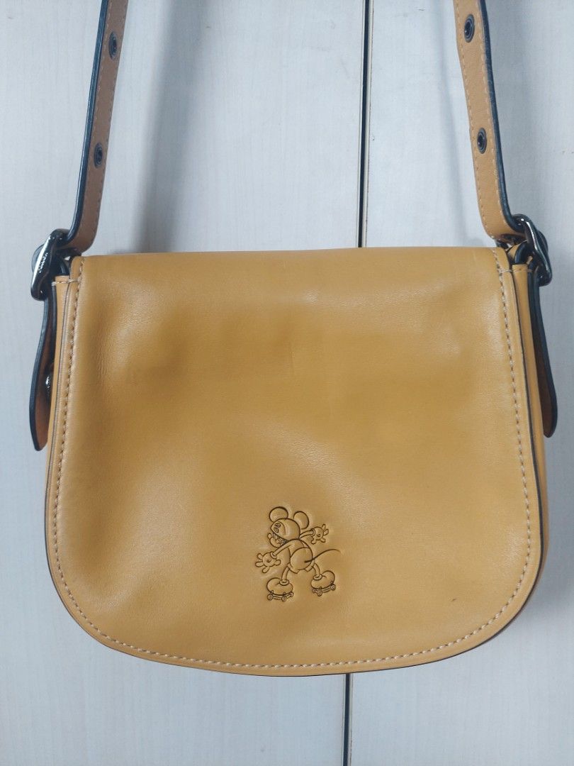 Disney X Coach 1941 Saddle Bag 23 with Mickey Mouse on Roller