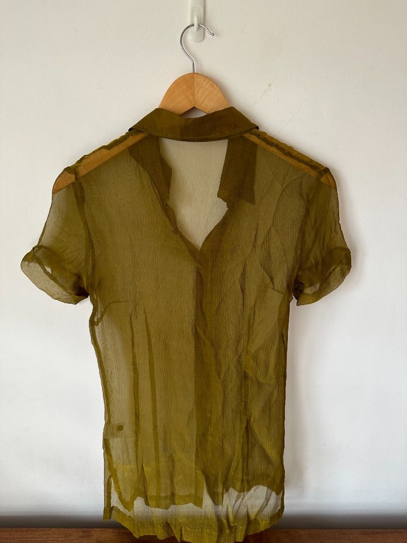 Dries Van Noten Sheer Shirt (Category: Blouses) located in Manila. Submitted by ia____ (Listing ID 1239212479, Image 2). Description: - RFS: Decluttering but also this piece doesn’t fit me anymore :( - ₱2,000 + SF - Bought it from Ersatz - Please note that there’s a button missing - MOP: Bank transfer (Unionbank) or Gcash - Delivery courier thru Grab or Lalamove c/o buyer (around Metro Manila only).