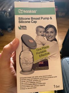 haakaa silicone breast pump with cap with free baby bag