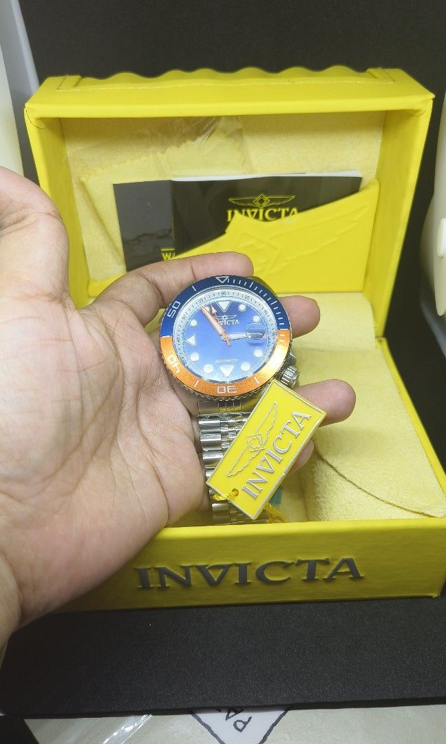 Invicta Automatic Watch (Category: Men's Watches) located in Rizal. Submitted by yves1211 (Listing ID 1239183561, Image 3). Description: Invicta Automatic 30415 Pro Diver Mens Watch Color blue, orange automatic type, 200 meters water resistance stainless steel men's watch. Screw down crystal type flame fusion. Further details on the attached pictures ..