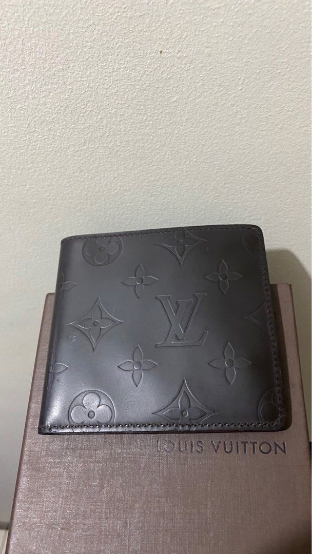 Louis Vuitton Dark Brown Leather Monogram Embossed Bifold Wallet, Luxury,  Bags & Wallets on Carousell