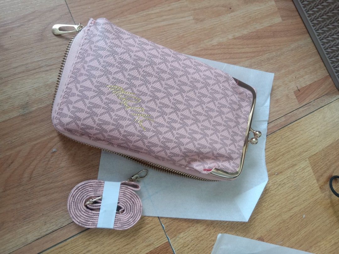 Micka@el K@rs Sling wallet pink/ Brown (Category: Wallets & Card holders) located in Quezon City. Submitted by ventaventa (Listing ID 1239168714, Image 3). Description: Sold per piece Brand new w/ sling strap Color pink and brown Size 8x4.5x2" 20x12xx5cm Ideal for gifts or personal use.