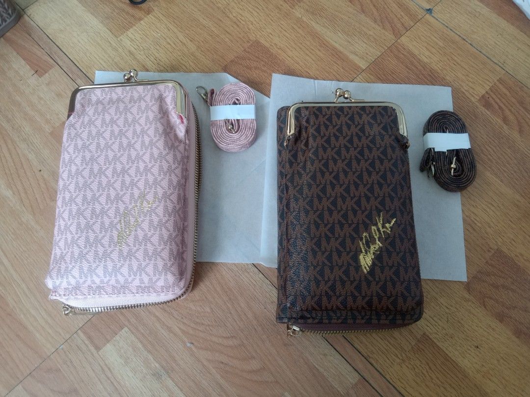 Micka@el K@rs Sling wallet pink/ Brown (Category: Wallets & Card holders) located in Quezon City. Submitted by ventaventa (Listing ID 1239168714, Image 1). Description: Sold per piece Brand new w/ sling strap Color pink and brown Size 8x4.5x2" 20x12xx5cm Ideal for gifts or personal use.