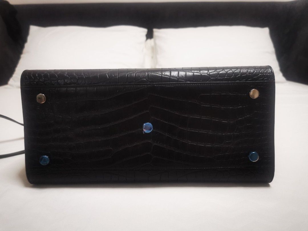 Saint Laurent YSL sac de jour (Category: Luxury Bags & Wallets) located in Manila. Submitted by goods4all (Listing ID 1239169185, Image 2). Description: Comes with dustbag and care cards. Small Size. Price slightly negotiable..