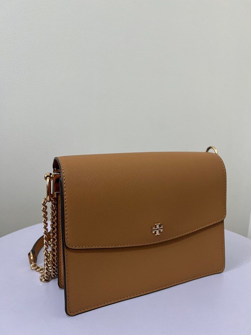 Tory Burch Emerson Flap 2 Way Bag (Category: Luxury Bags & Wallets) located in Quezon City. Submitted by __declutter (Listing ID 1239203402, Image 1). Description: • BARELY used • Condition: 9/10 • No leather scratches • SRP: Php 28,000 • Authentic (Got from the US) • Can be worn 2 ways - shoulder and cross body • Super elegant and fits so much.