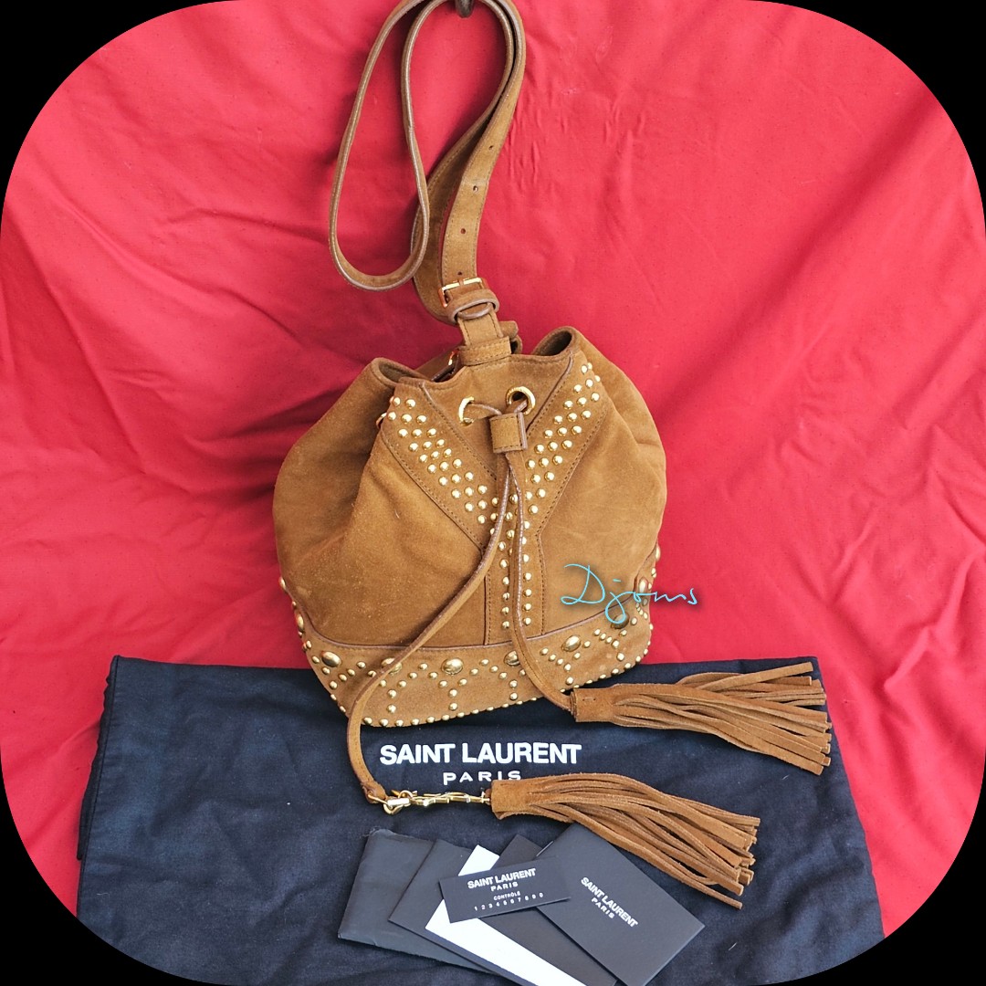 Saint Laurent Le Monogramme Bucket Bag In Studded Suede in Brown