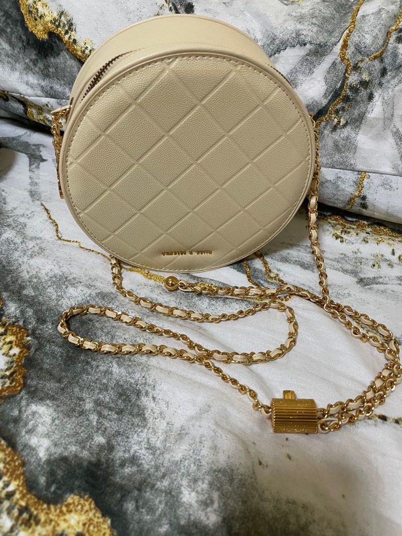 Gold circle hotsell bag